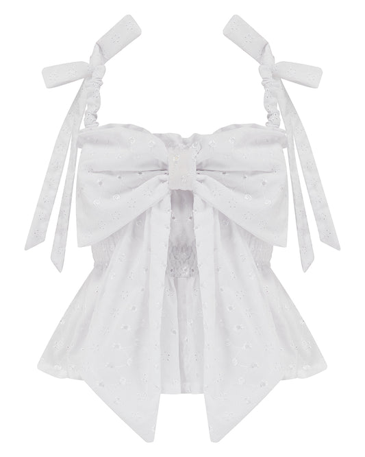 White broderie anglaise bow top with shoulder straps and bust detail, elasticated waist and ruched straps. Delta Of Phoenix Gypsy Bow Top