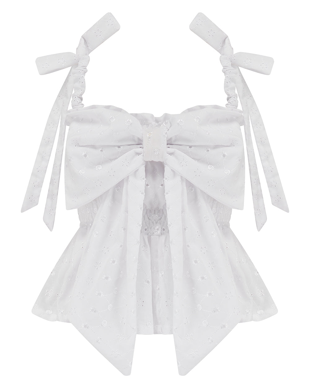 White broderie anglaise bow top with shoulder straps and bust detail, elasticated waist and ruched straps. Delta Of Phoenix Gypsy Bow Top
