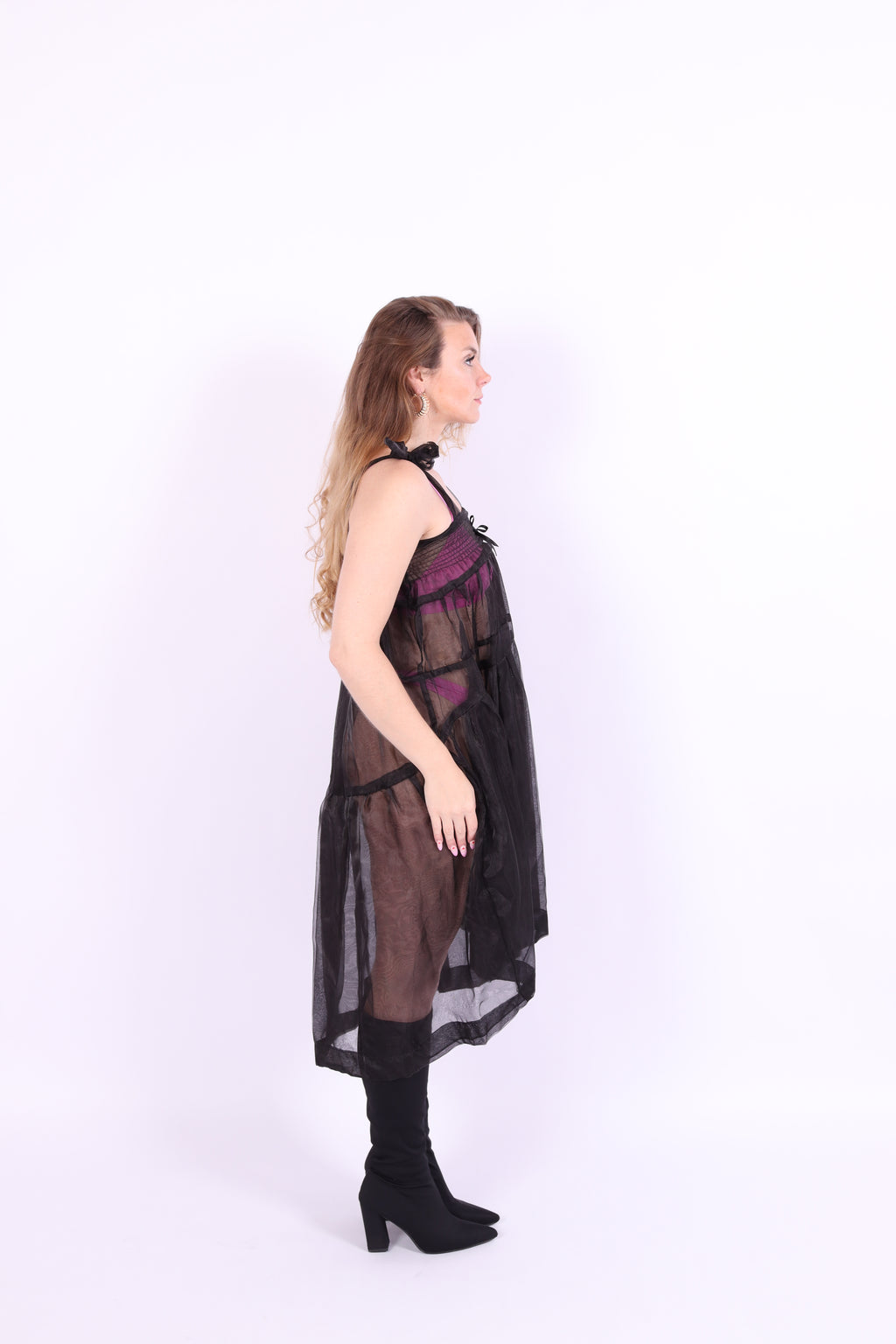 Black organza waterfall dress with a flowing full skirt, organza bow shoulder straps, and an elasticated shirring panel across the top bodice. Delta of phoenix buffy 2.0 dress