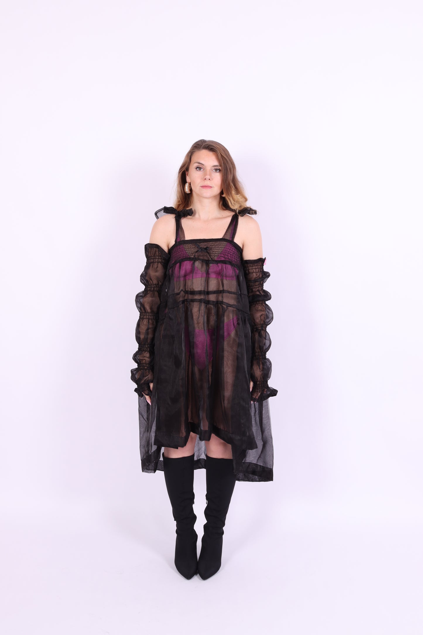A pair of black organza puff sleeves with adjustable length and thumb hole, designed to be fingerless. Delta Of Phoenix Black Buffy Sleeves