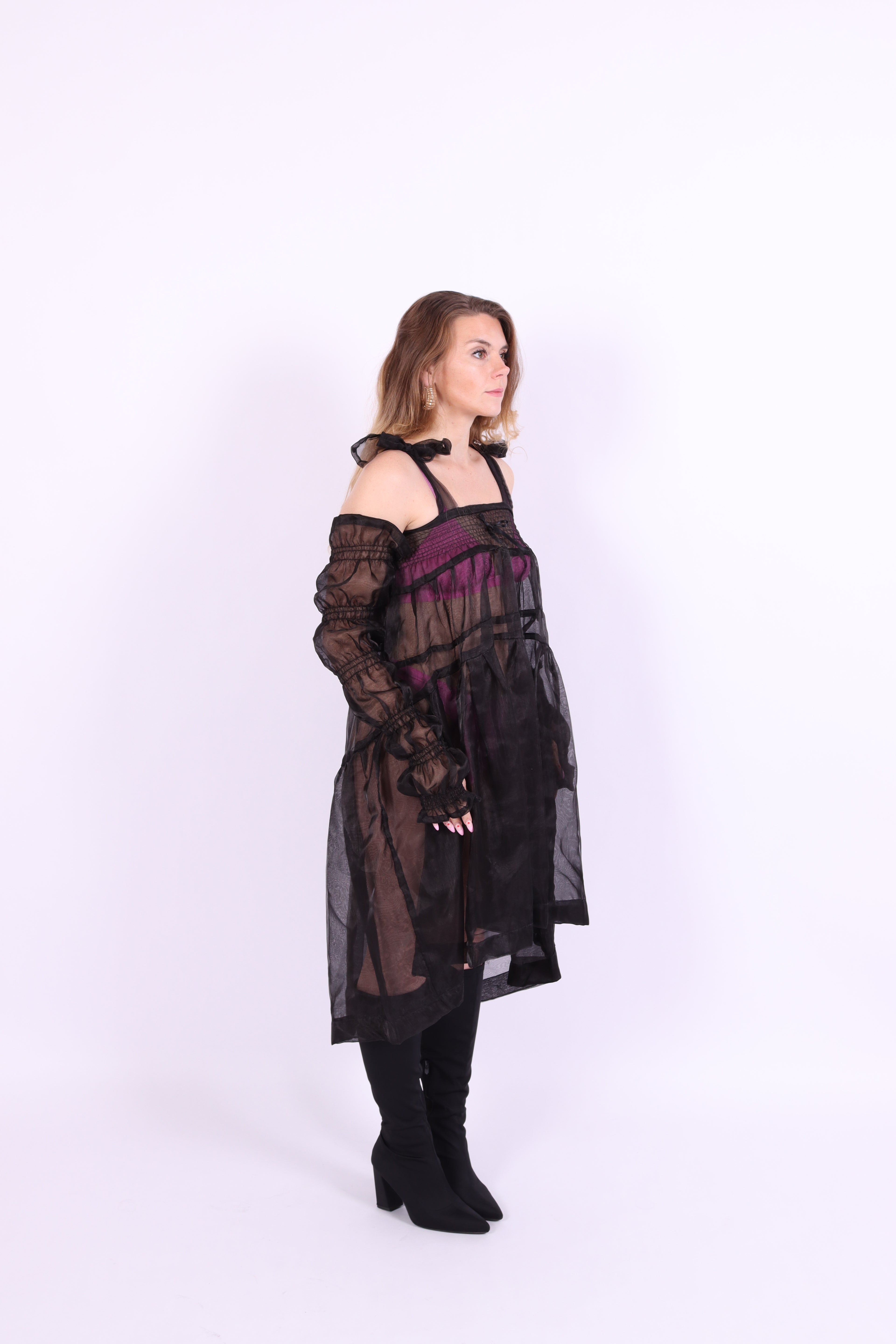 A pair of black organza puff sleeves with adjustable length and thumb hole, designed to be fingerless. Delta Of Phoenix Black Buffy Sleeves