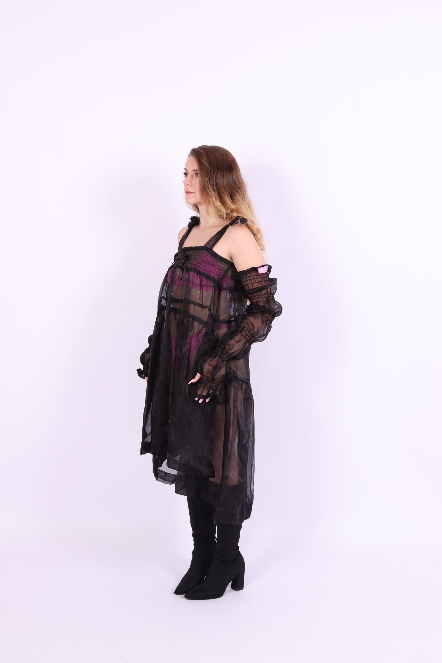 A pair of black organza puff sleeves with adjustable length and thumb hole, designed to be fingerless. Delta Of Phoenix Black Buffy Sleeves