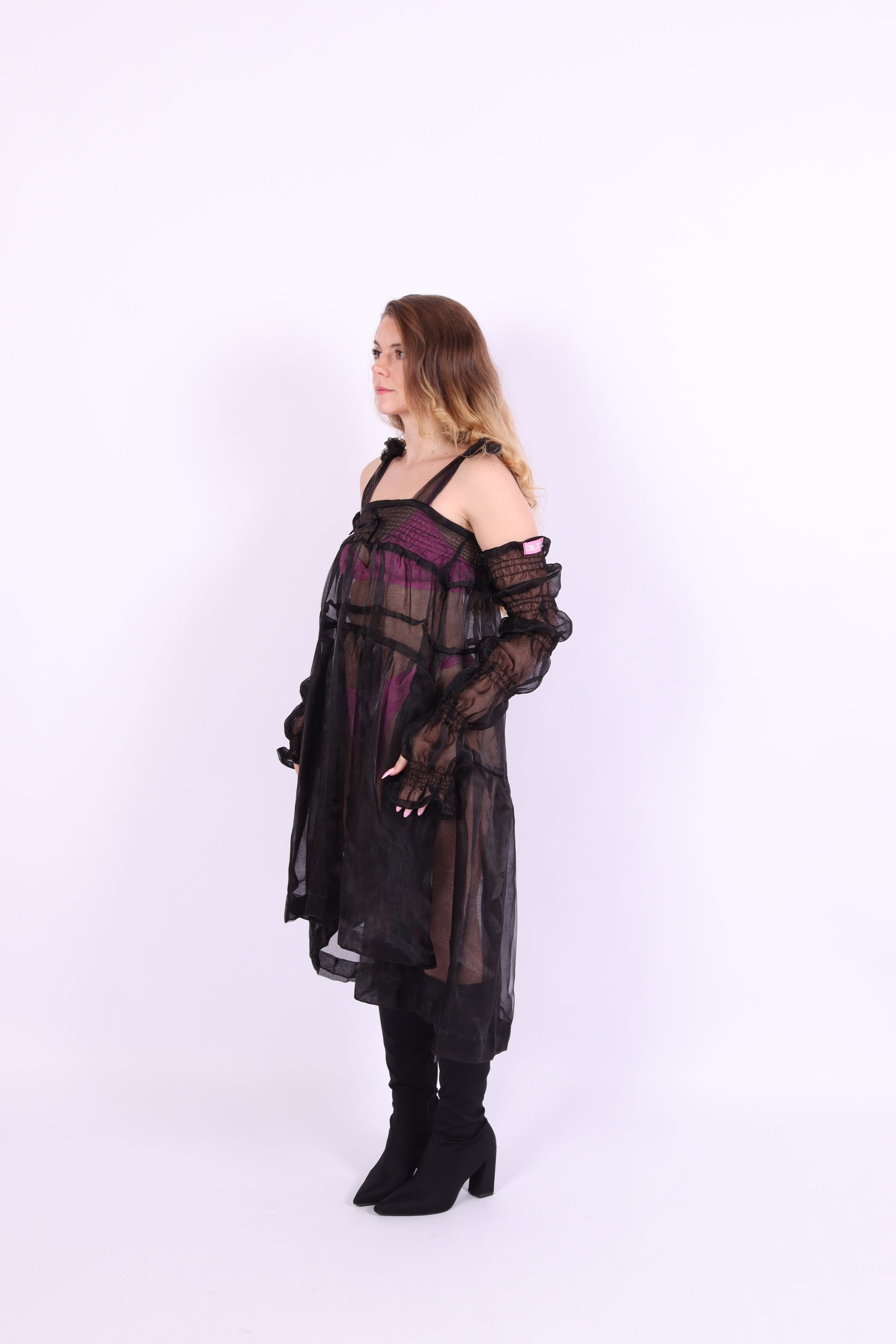 A pair of black organza puff sleeves with adjustable length and thumb hole, designed to be fingerless. Delta Of Phoenix Black Buffy Sleeves