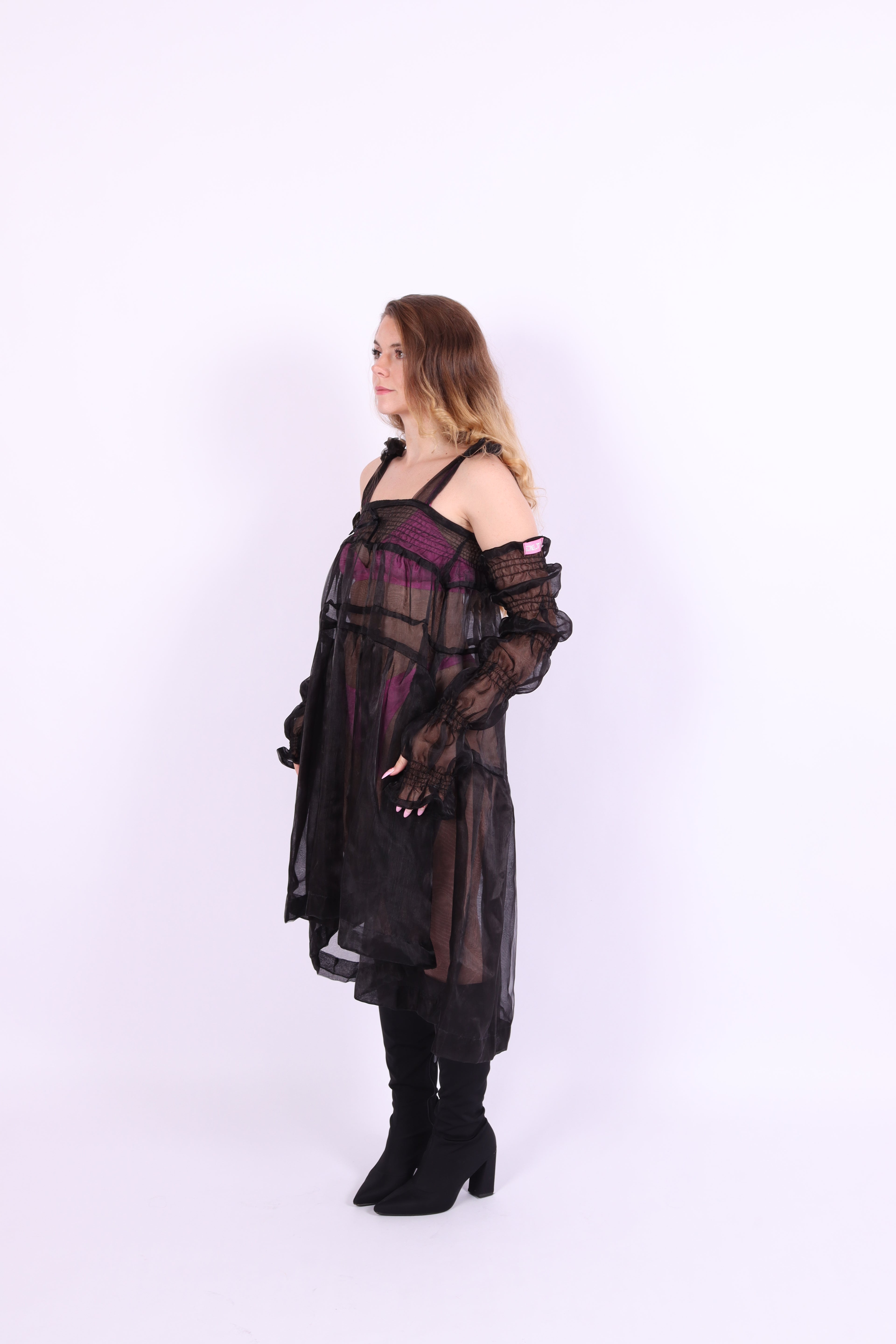 A pair of black organza puff sleeves with adjustable length and thumb hole, designed to be fingerless. Delta Of Phoenix Black Buffy Sleeves