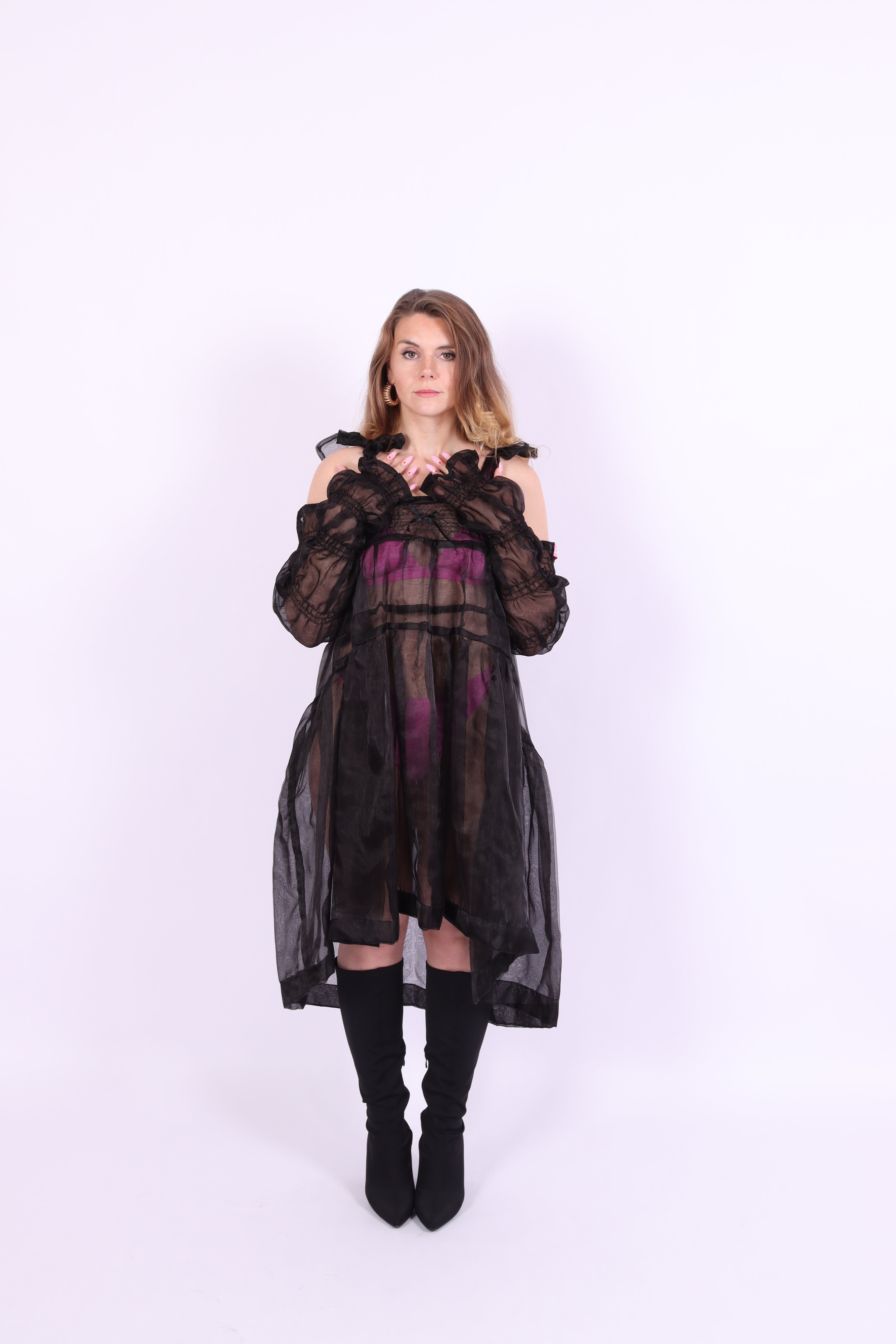 A pair of black organza puff sleeves with adjustable length and thumb hole, designed to be fingerless. Delta Of Phoenix Black Buffy Sleeves