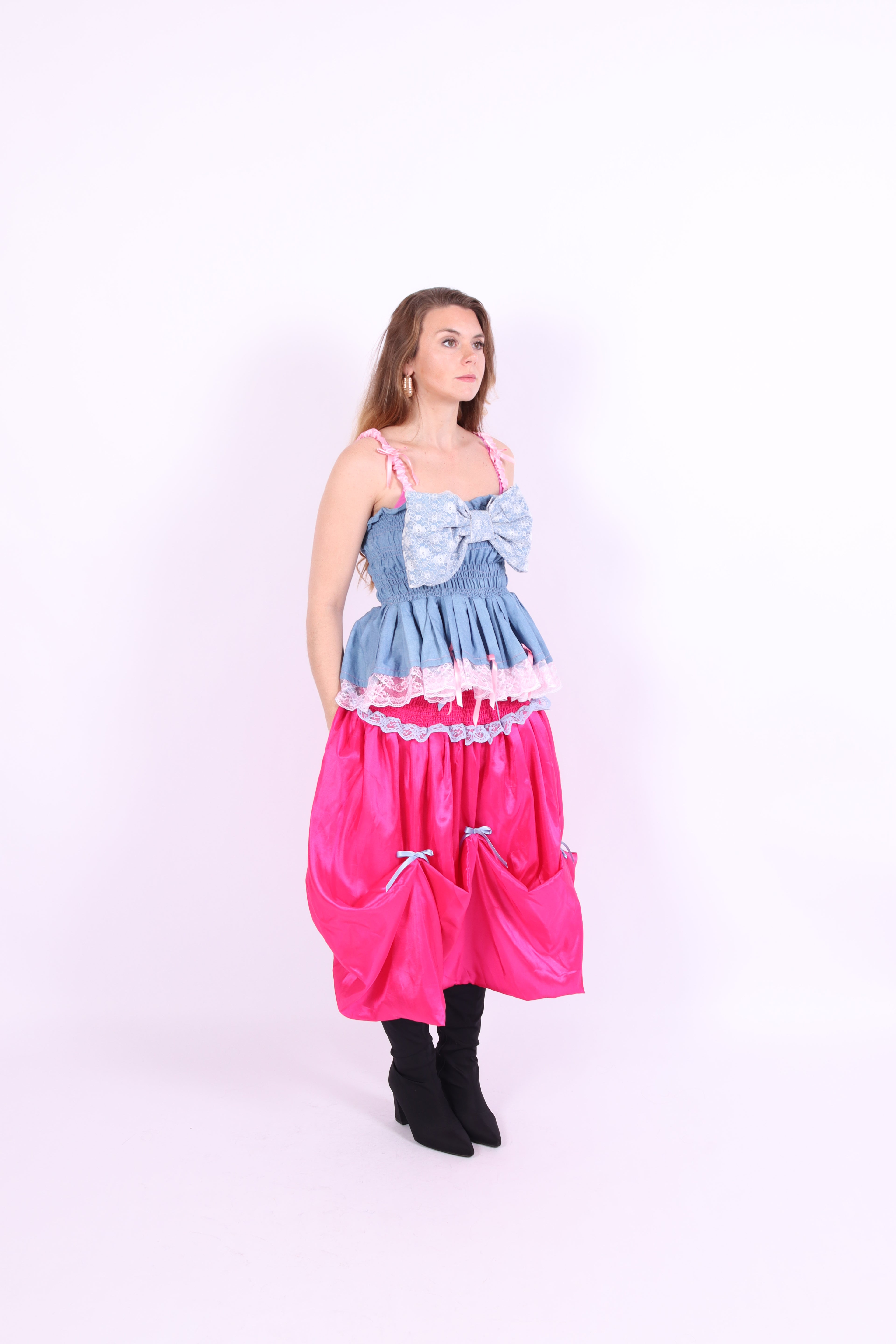 Denim blue bow top with a large white lace bow and pink bows on straps. Gitta Bow Top - Delta Of Phoenix