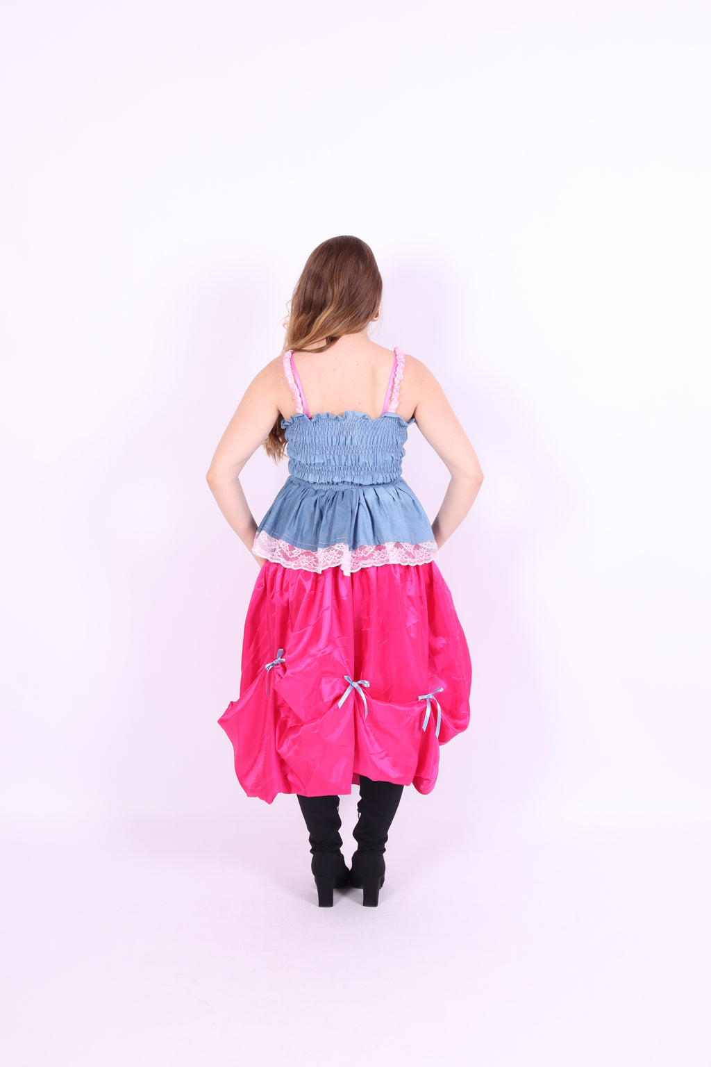 Denim blue bow top with a large white lace bow and pink bows on straps. Gitta Bow Top - Delta Of Phoenix