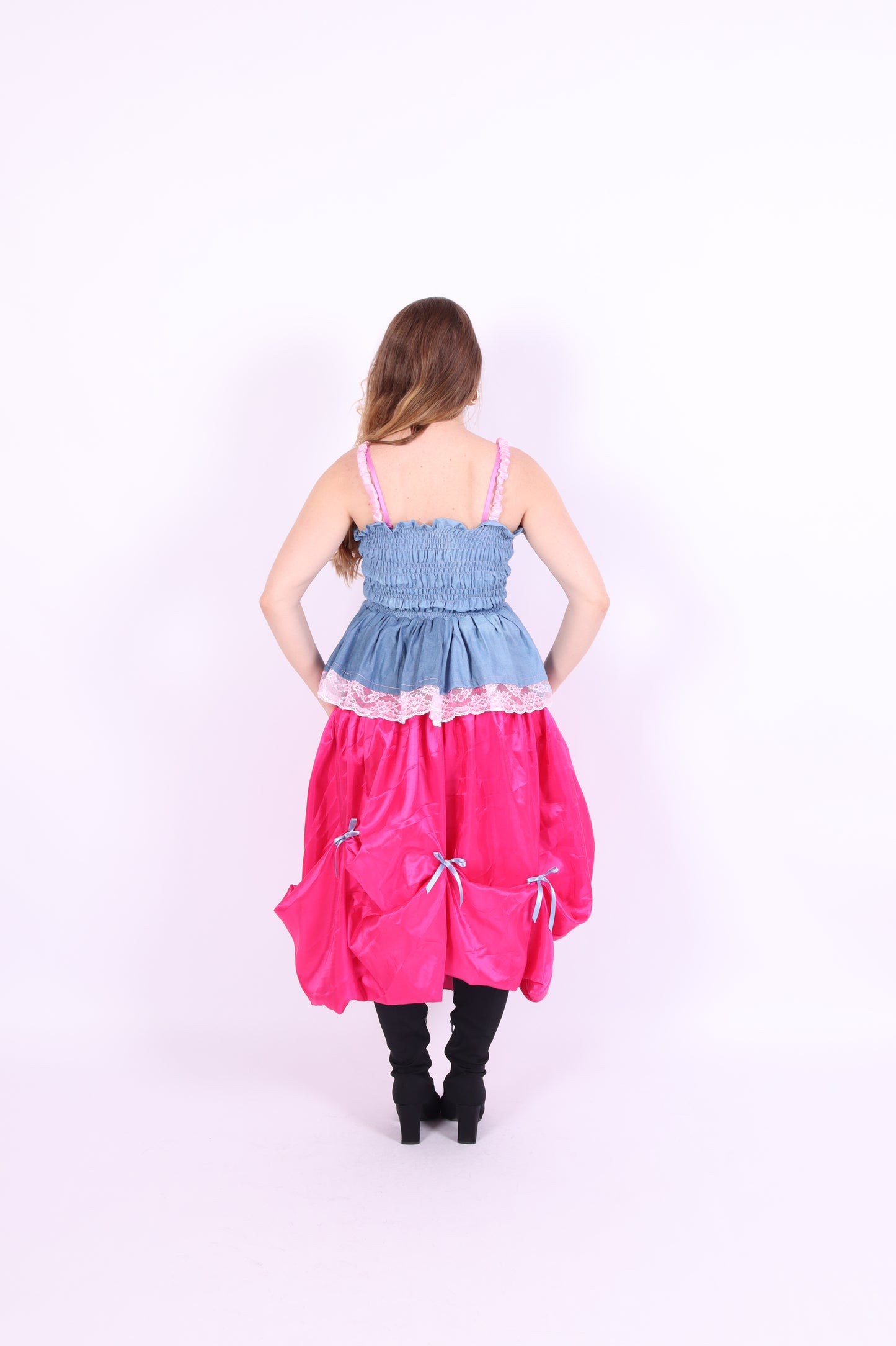 Denim blue bow top with a large white lace bow and pink bows on straps. Gitta Bow Top - Delta Of Phoenix