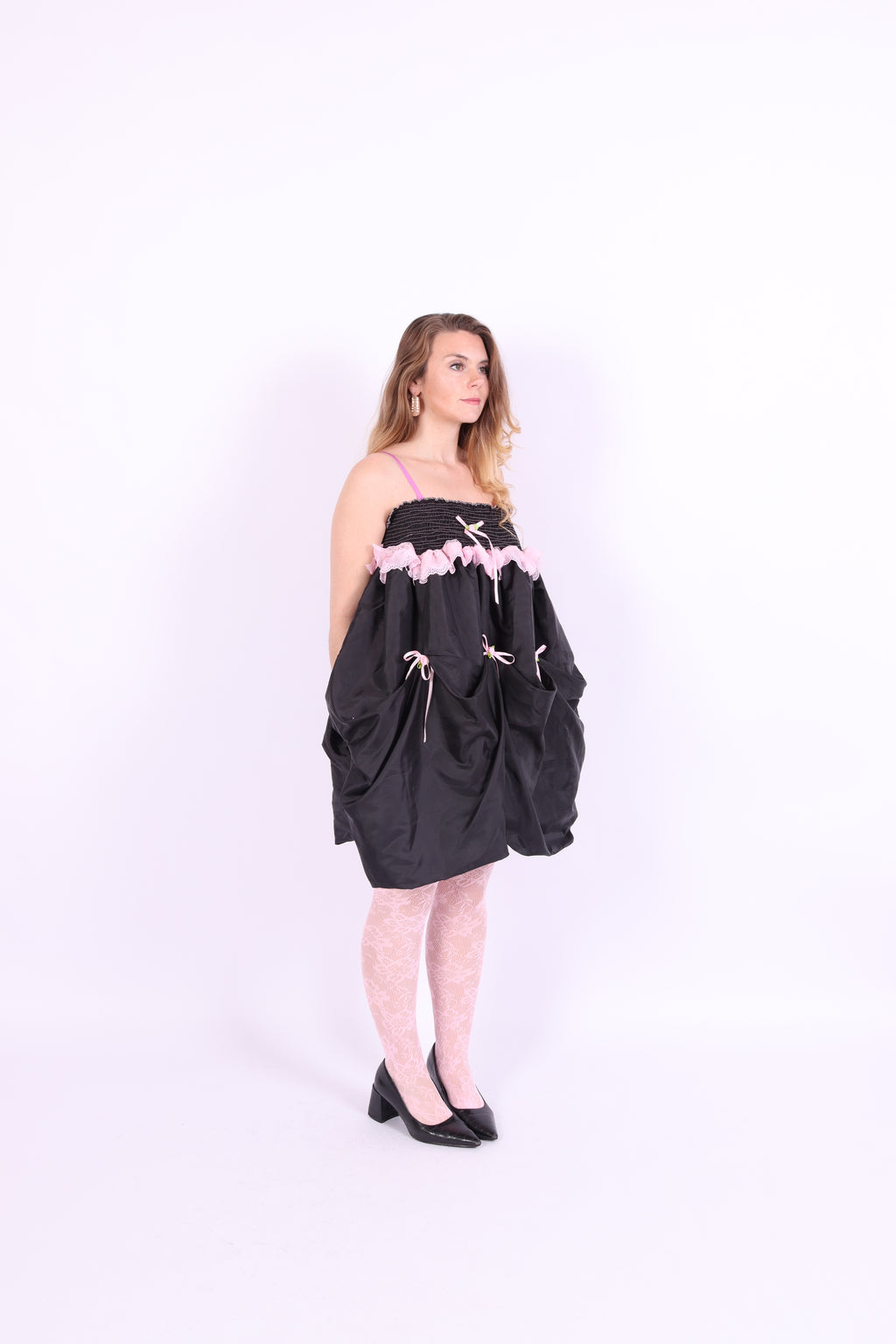 Black midi bubble skirt in black taffeta with pink lace and pink bows - Dahlia Midi Skirt - Delta Of Phoenix - worn as dress