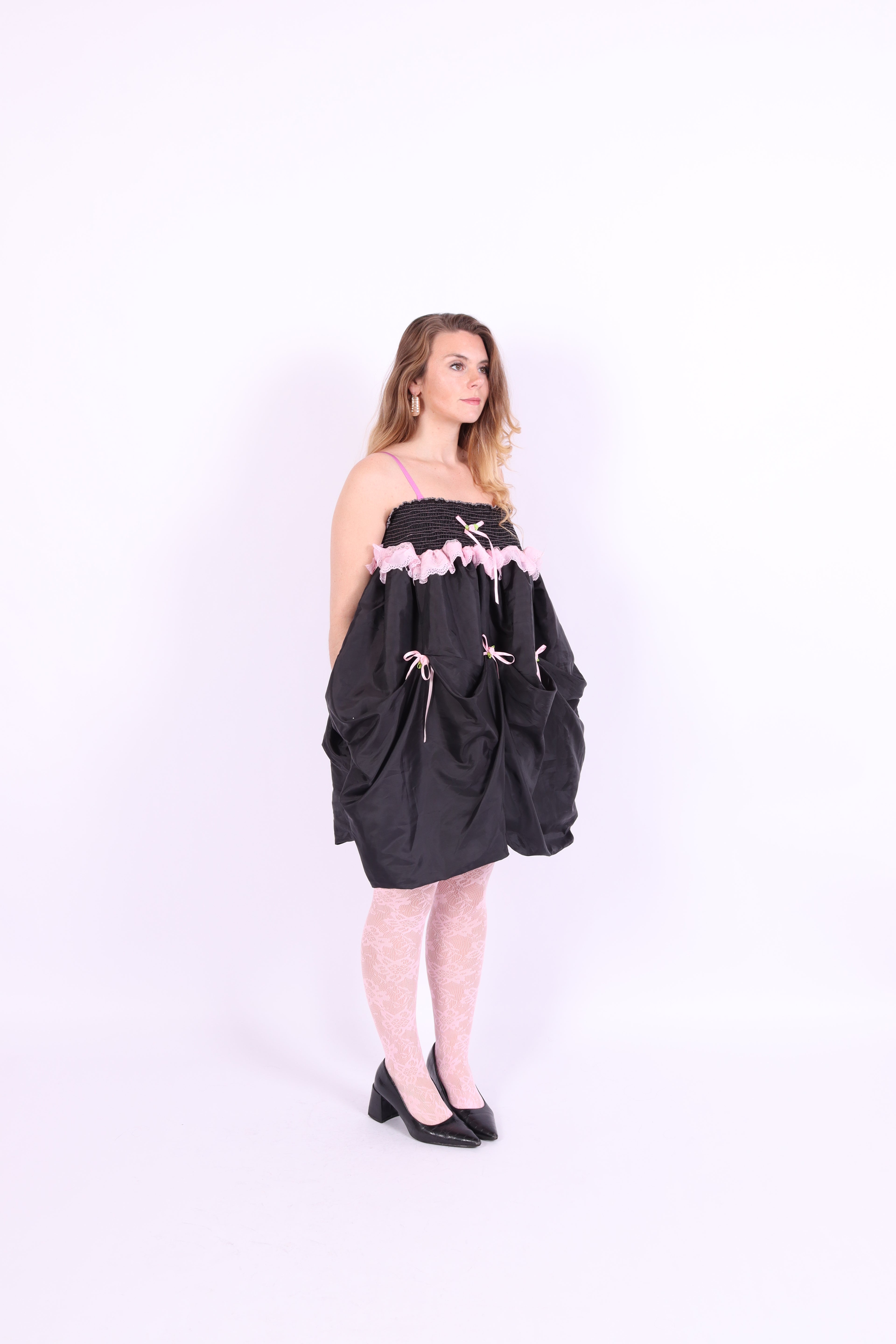 Black midi bubble skirt in black taffeta with pink lace and pink bows - Dahlia Midi Skirt - Delta Of Phoenix - worn as dress