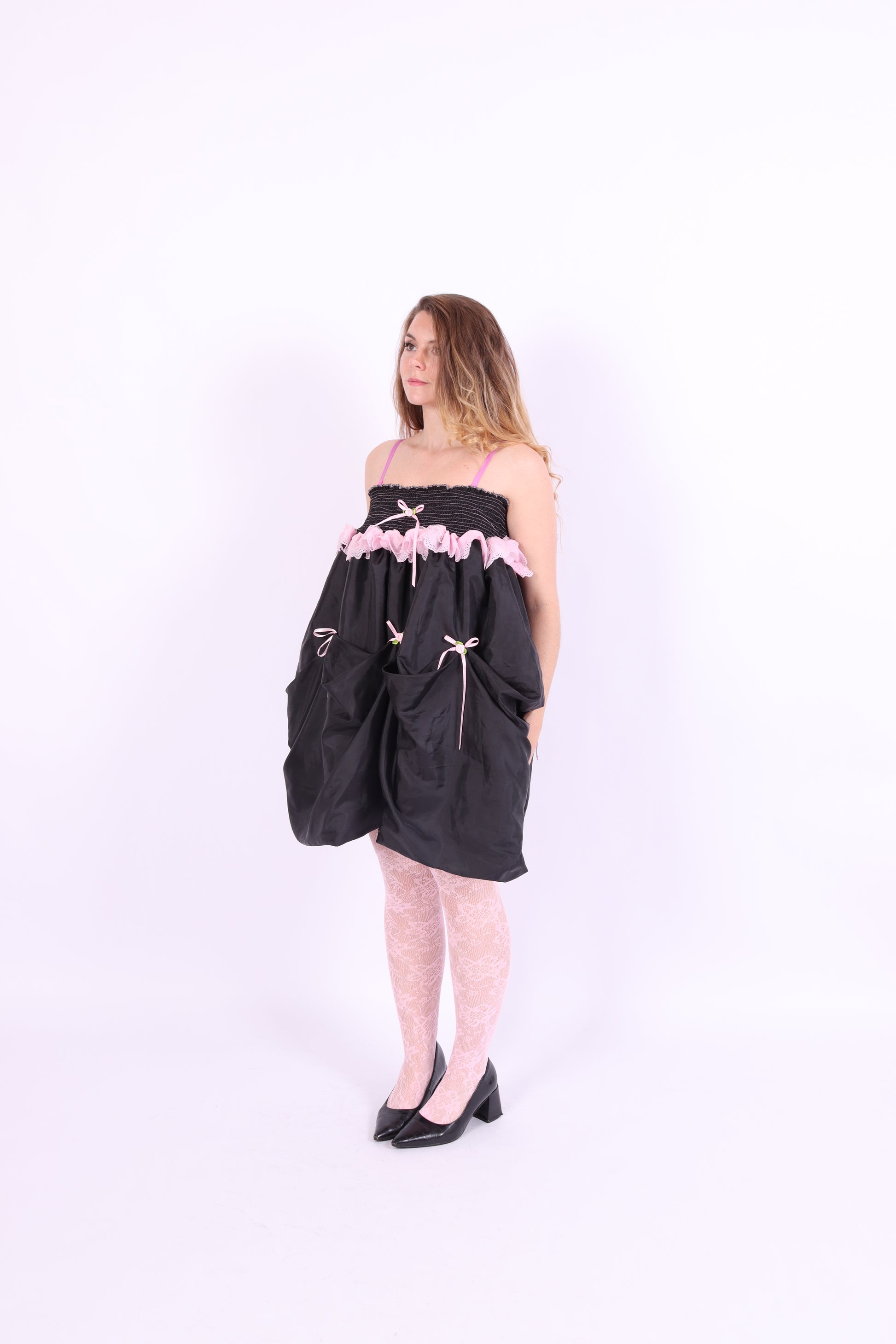 Black midi bubble skirt in black taffeta with pink lace and pink bows - Dahlia Midi Skirt - Delta Of Phoenix - worn as dress